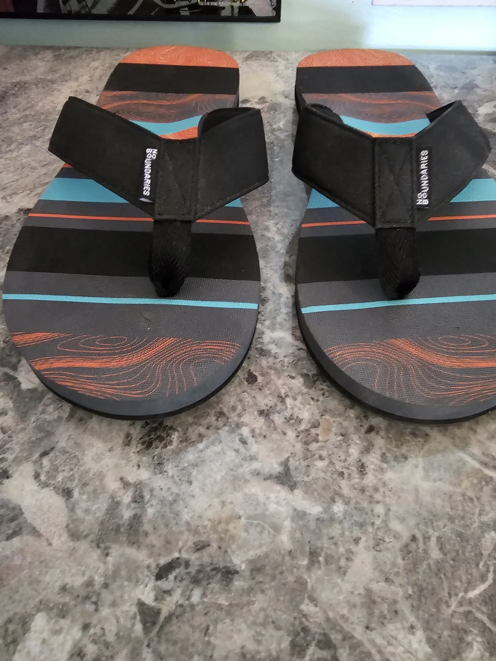 No Boundaries Men’s Black Flip-Flops with Orange and Teal Stripes